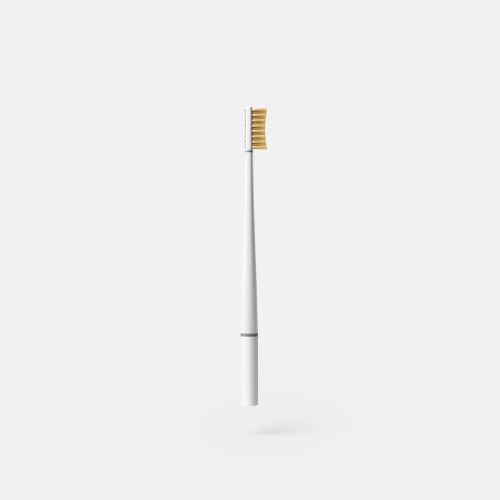 Medium hardness toothbrush with vitamin C