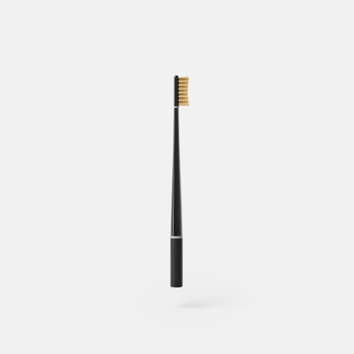 Medium hardness toothbrush with vitamin C